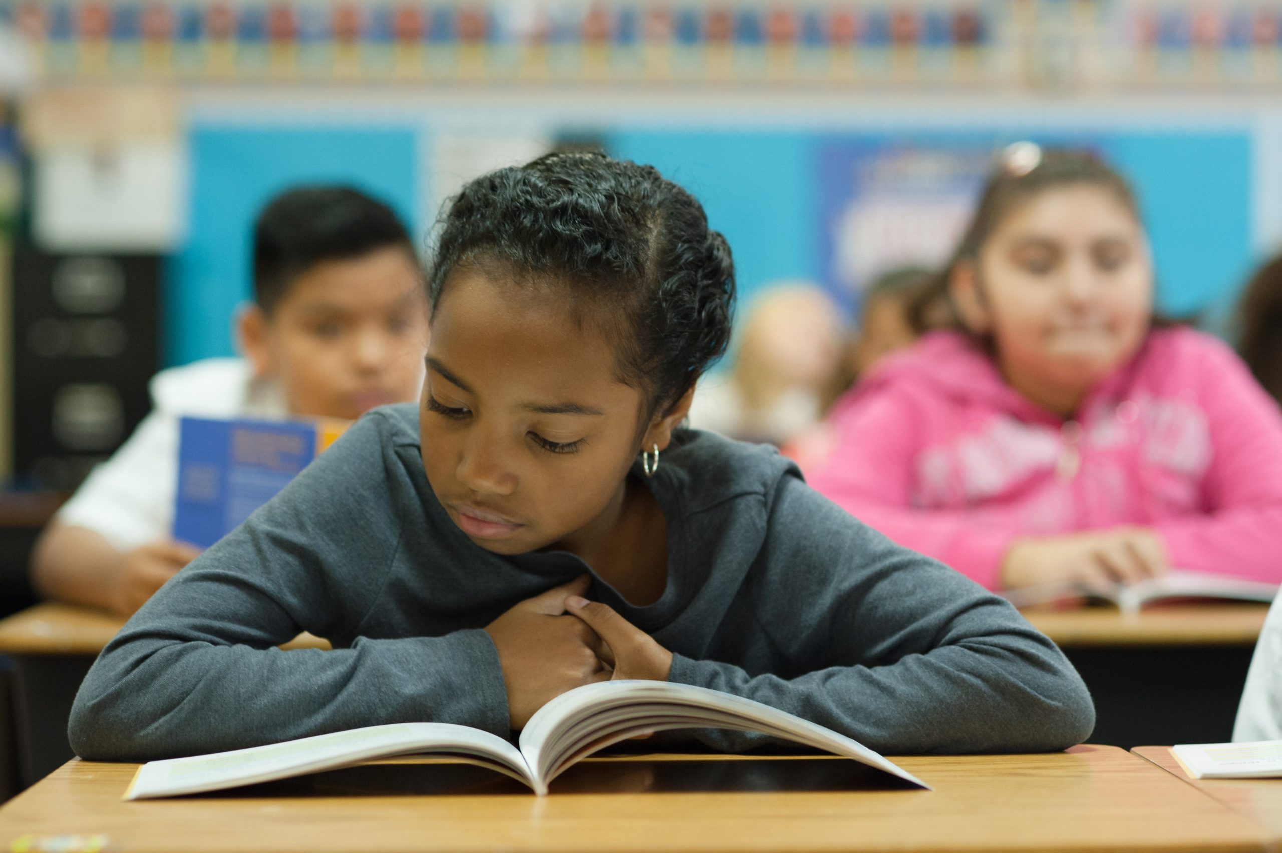 girl reading TBM book